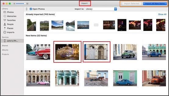 open iPhoto and select 'Import' button